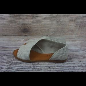 1. State Asymmetrical open toe flat